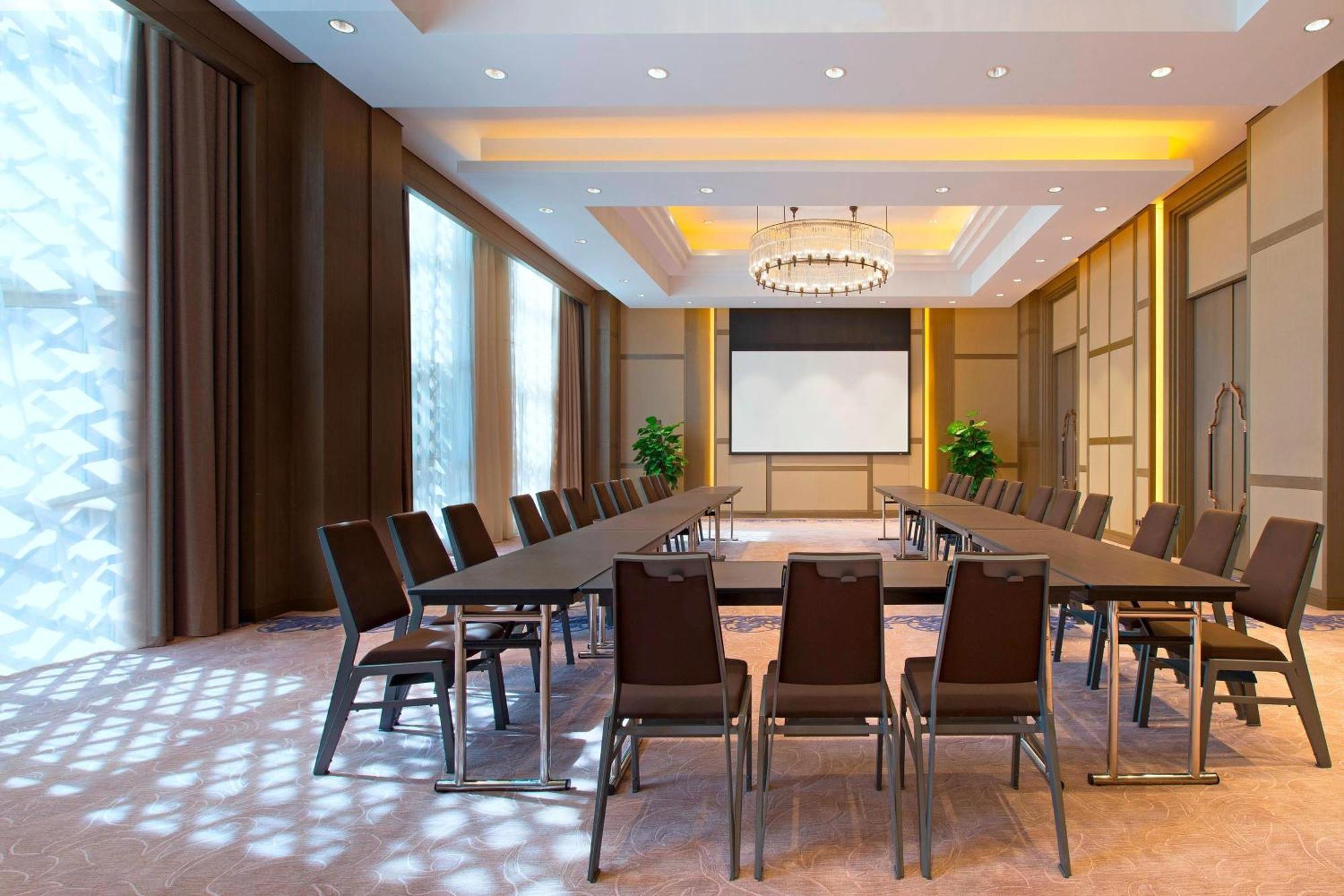 Sheraton Grand Xishuangbanna Hotel Цзинхун Экстерьер фото