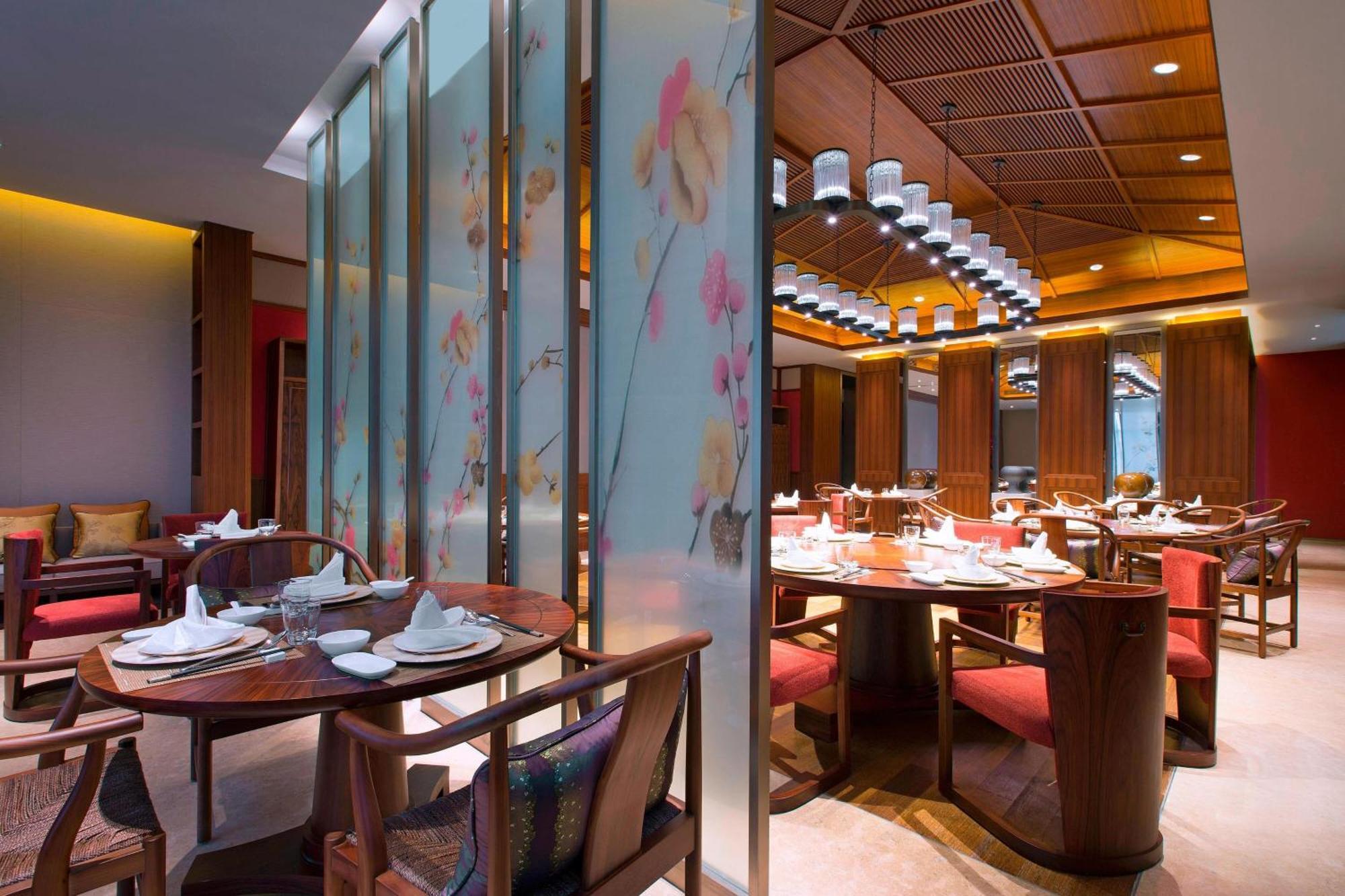 Sheraton Grand Xishuangbanna Hotel Цзинхун Экстерьер фото